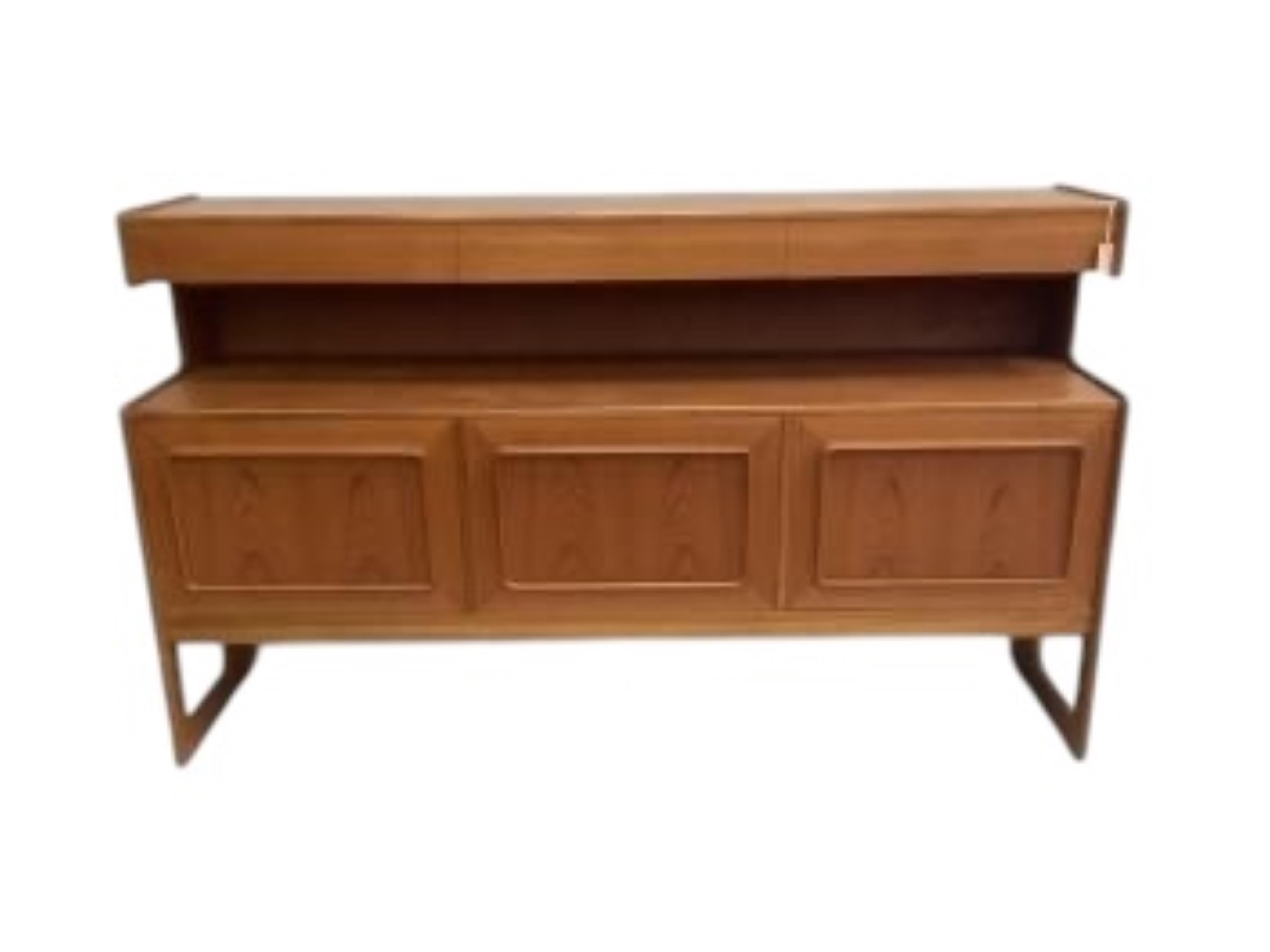 A mid century Danish style MacIntosh Forfar teak sideboard, width 170cm, depth 46cm, height 102cm together with a McIntosh teak extending dining table and four chairs teak sideboard, width 170cm, depth 46cm, height 102cm